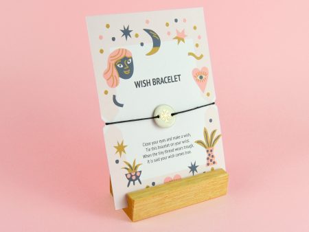 Brăţară cu nod culisant – fulg de zăpadă, decorată manual cu aur sau platină. Mărgea: 2x2 cm. Deschidere: 8-4 cm. Produs de Gruni.